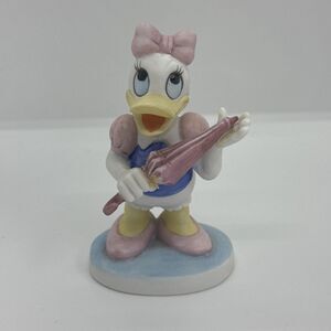 Vintage Disney Daisy Duck Bisque Figurine Waiting for Rain with her Umbrella 4"